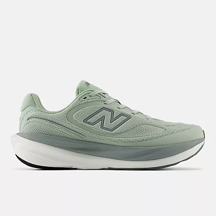 New Balance 1080v15 running shoes in light green with mesh upper and cushioned midsole, side view.