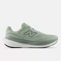 New Balance 1080v15 running shoes in light green with mesh upper and cushioned midsole, side view.
