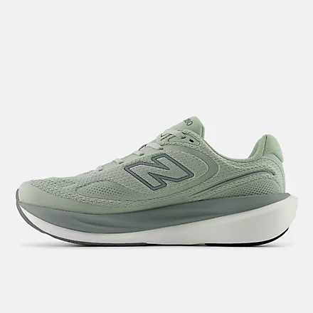 New Balance 1080v15 running shoes in light green mesh with cushioned midsole, side view.