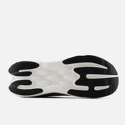 New Balance 1080v15 running shoes outsole with black rubber traction patterns and white cushioning.