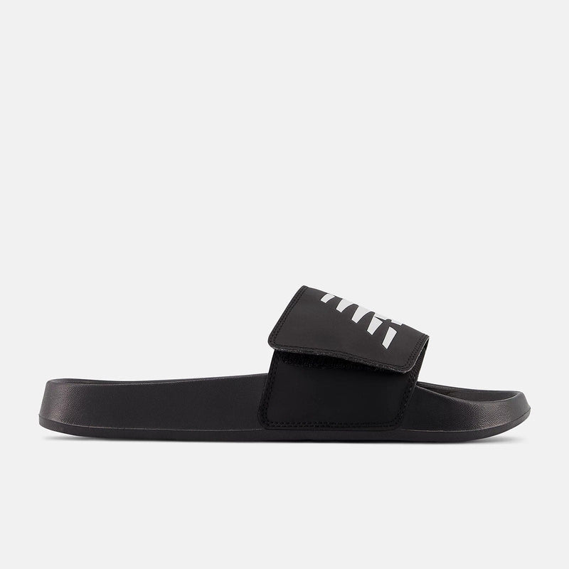 New Balance 200v2 Adjustable slide sandals in black with a hook-and-loop strap and white graphic design, side view.