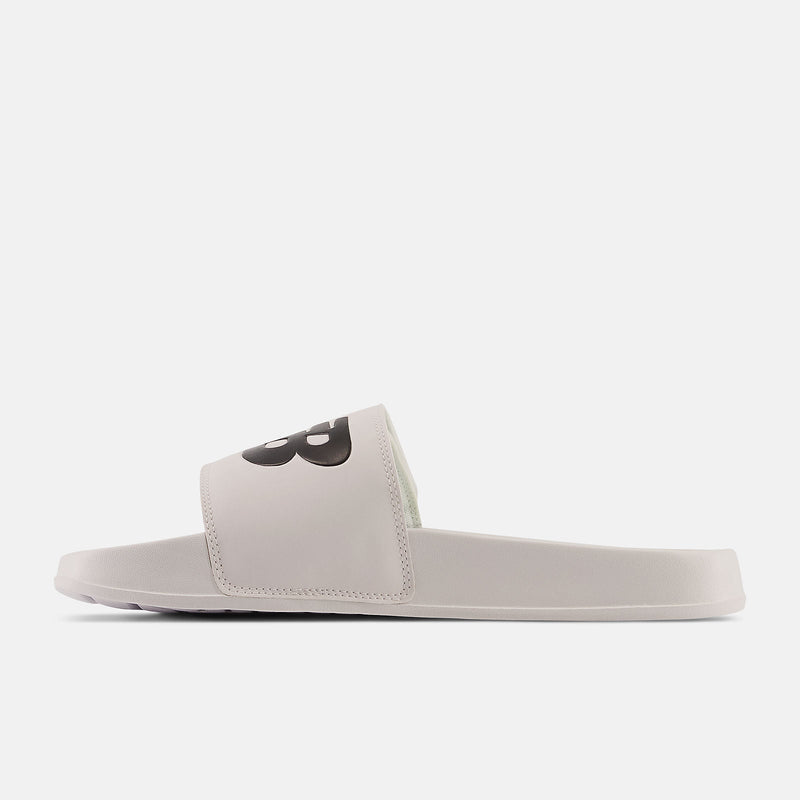 New Balance 200v2 Adjustable sandals in light gray with a black logo on the strap, side view.