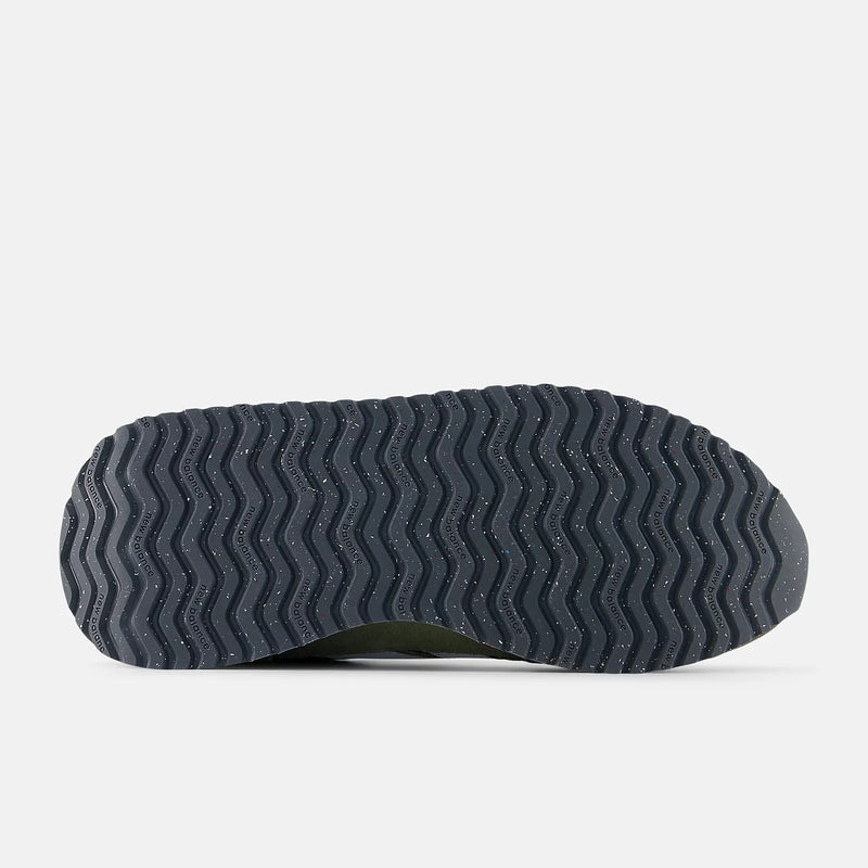New Balance 237 sneakers outsole in dark gray rubber with wavy tread pattern and speckled design, sole/bottom view.