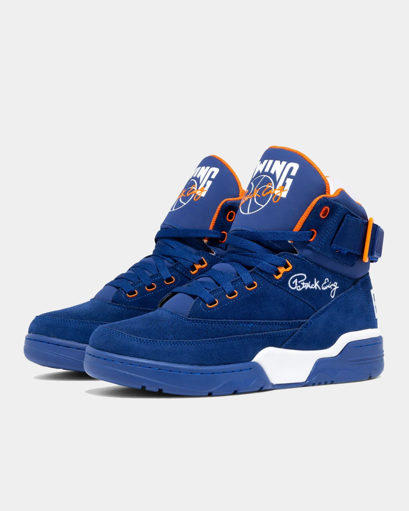 Ewing Athletics 33 HI OG high-top sneakers in blue suede with orange accents, ankle strap, and branding details, angled side view.