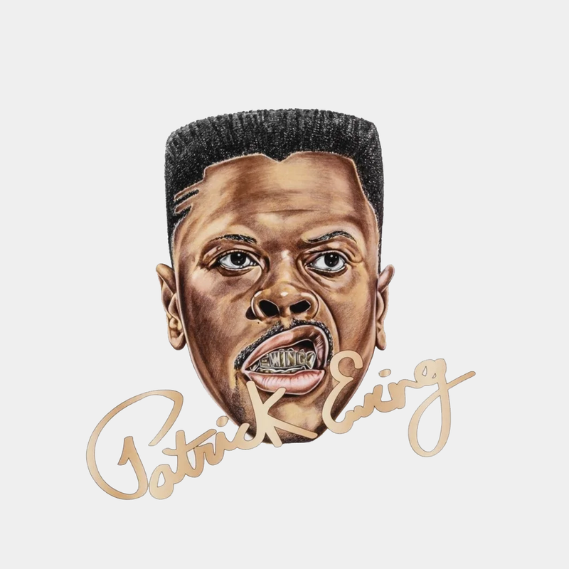 "Ewing Athletics 33 HI x LAURENS J collectible accessory featuring a sculpted head design with Patrick Ewing signature in gold, front view"