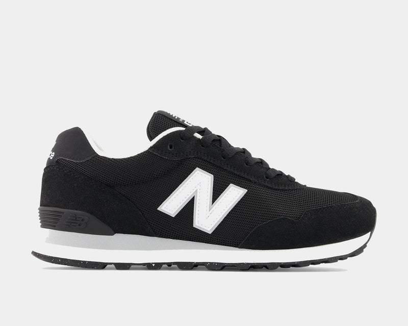 New Balance 515 v3 sneakers in black with mesh upper, white side logo, suede overlays, and speckled outsole, side view.