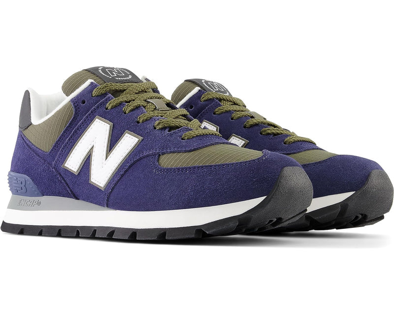 New Balance 574 Rugged shoes in purple suede and olive green textile with white logo and ENCAP midsole, front angled view.