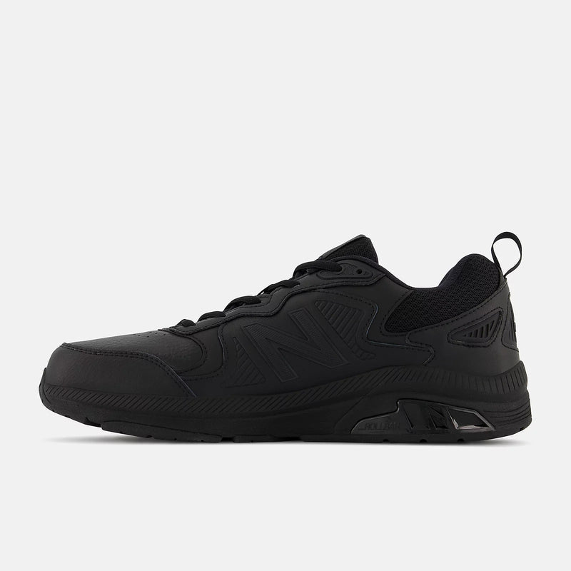 New Balance 857v3 Slip Resistant shoes in all-black with durable leather upper, mesh panels, and slip-resistant outsole, side view.