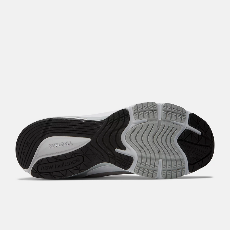 New Balance 990v6 running shoes outsole showcasing FuelCell cushioning and multidirectional tread pattern in black and gray rubber.