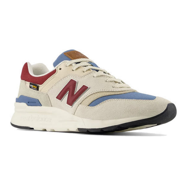 New Balance 997H sneakers, beige suede upper with blue and maroon accents, lightweight midsole, side angle view.