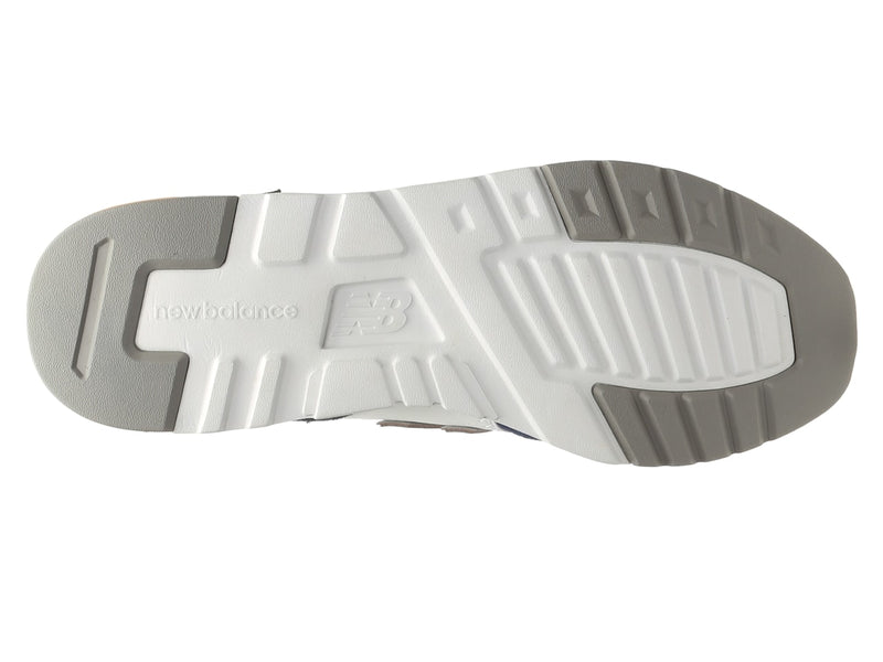 New Balance 997H sneakers outsole in white and gray showing textured tread pattern and logo detailing.