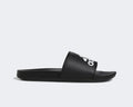 Adidas Adilette Comfort slides in black with white logo on synthetic strap and cushioned sole, side view.
