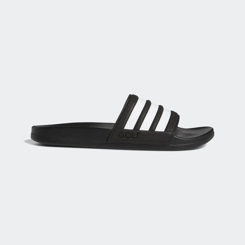 Adidas Adilette Comfort slides in black with white three-stripe design and "GOLF" branding, side view.