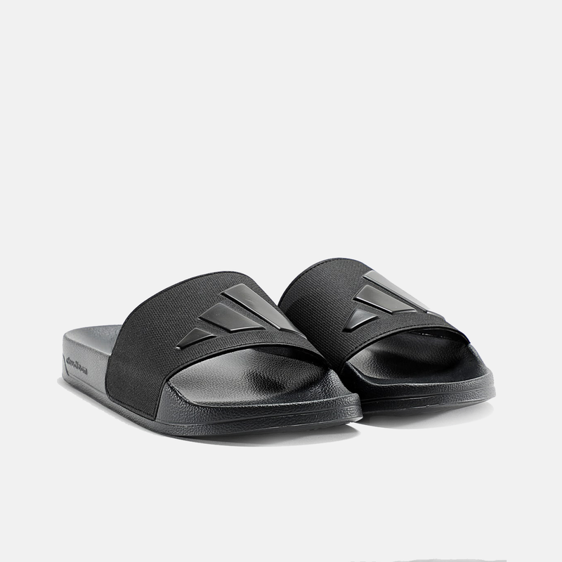 Adidas Adilette Shower Slides in black with textured footbed and wide strap featuring Adidas logo, front angle view.