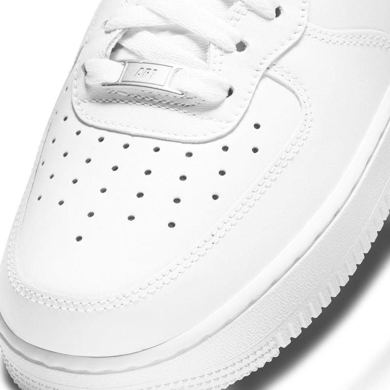 Nike Air Force 1 Mid '07 sneakers, close-up of white leather upper with perforations and AF1 lace tag.