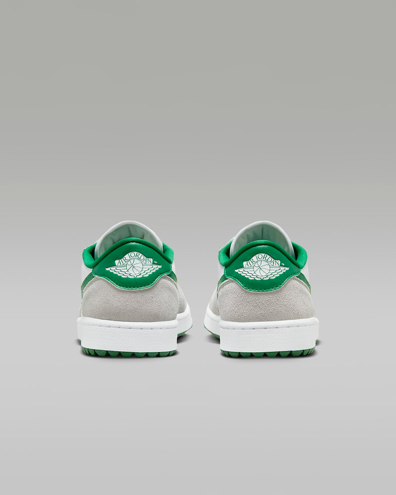 Nike Air Jordan 1 Low G sneakers back view showing gray suede heel panel with green collar and Air Jordan Wings logo detailing.