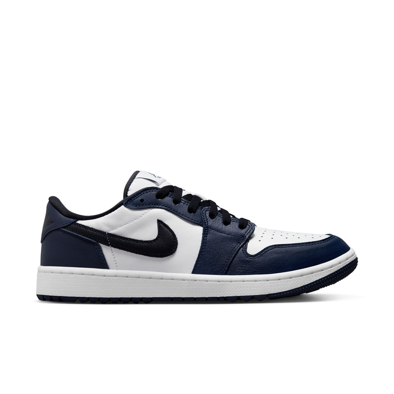Nike Air Jordan 1 Low G sneakers in white and navy blue leather with black laces and Swoosh logo, side view.