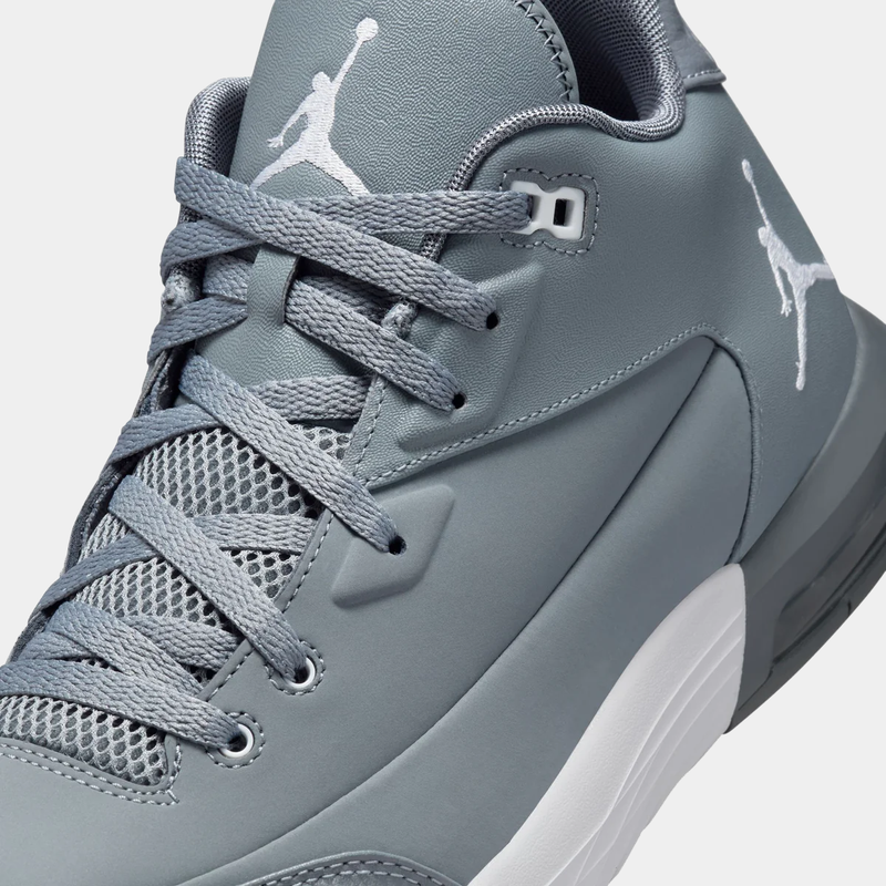 "Nike Air Jordan Flight Origin 3 sneakers in gray with white Jumpman logo, mesh tongue, and padded collar, angled close-up view"