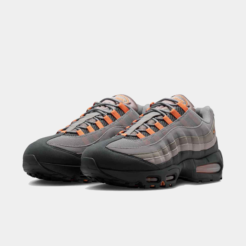 Nike Air Max 95 Big Bubble "OG" sneakers in gray and black with orange accents, front angle view.