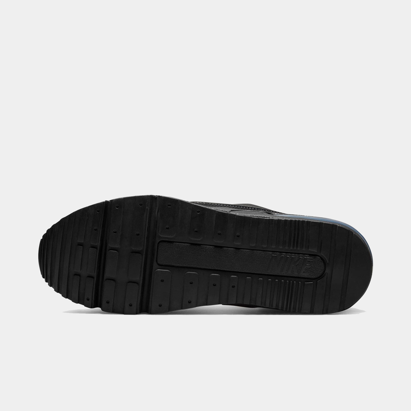 Black shoe sole on a light gray background