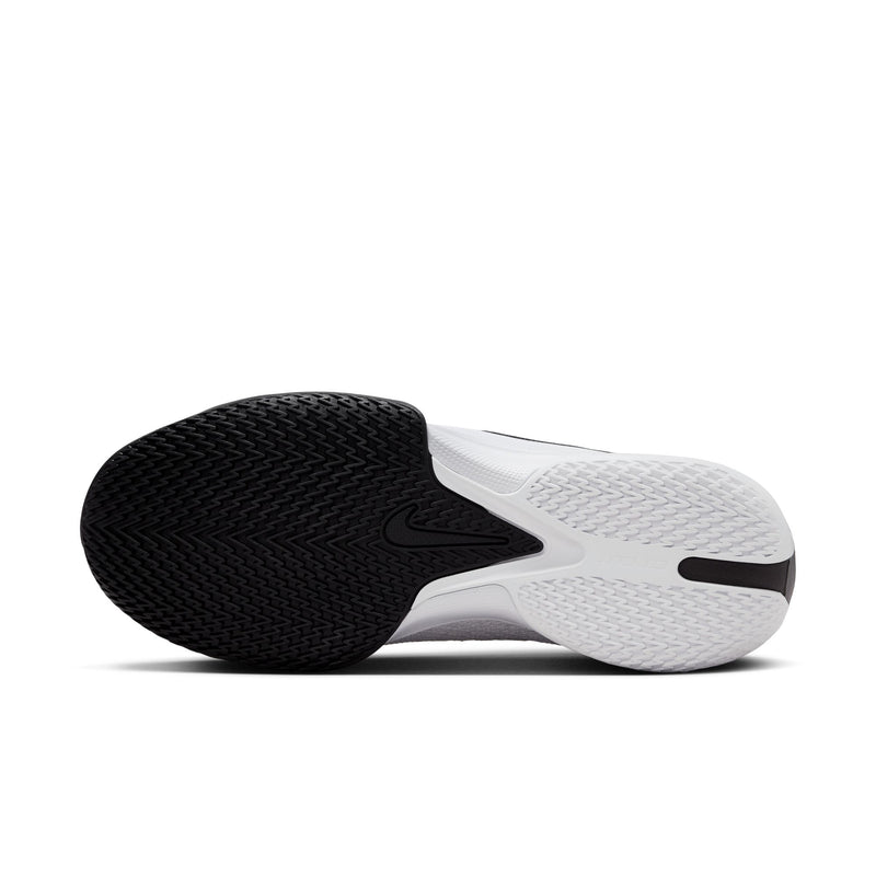 Nike Air Zoom G.T. Cut Academy basketball shoes outsole view featuring black and white rubber with multidirectional traction pattern.