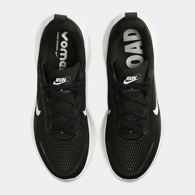 Nike Air Zoom Vomero 18 running shoes, black with white accents, breathable mesh upper and lace-up design, top view.