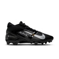 Nike Alpha Menace Elite 4 football cleats in black with silver accents, textured upper, and spike plate, side view.