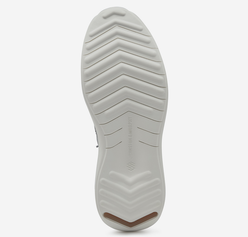 Johnston & Murphy Amherst 2.0 Knit Plain Toe shoes outsole in white with chevron traction pattern and embossed branding, sole/bottom view.