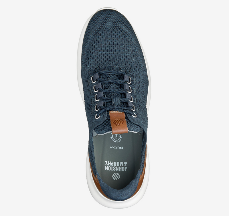 Johnston & Murphy Amherst 2.0 Knit Plain Toe shoes in navy blue knit with brown leather accent, top view showing lace-up design.