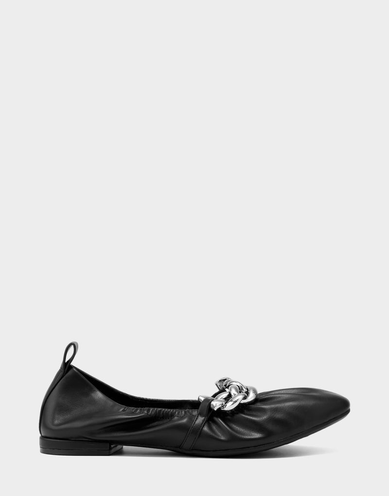 Comfortable Women's Dress Flat in Black Faux Leather Side View
