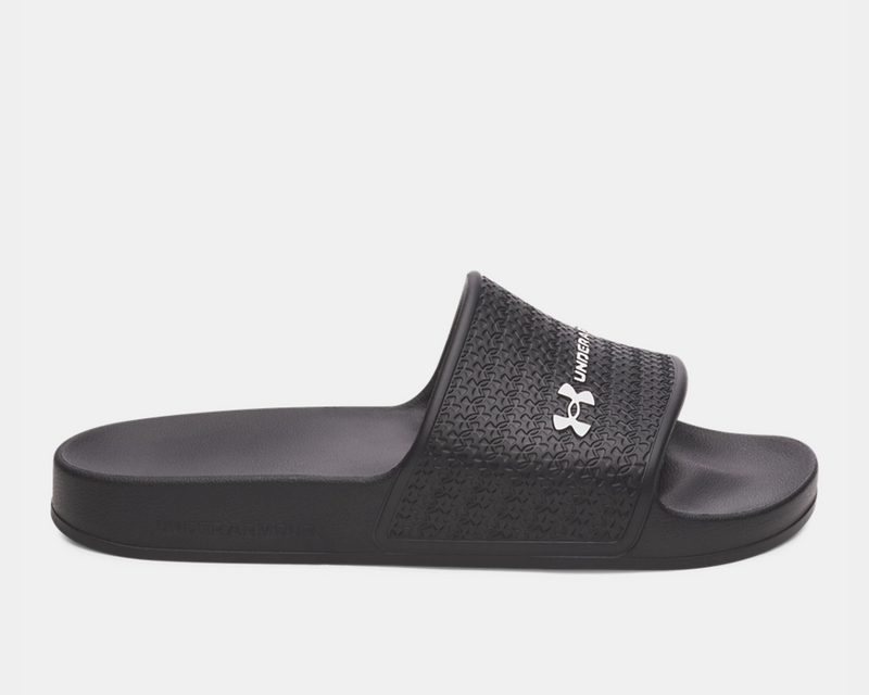 Under Armour ARMR Shower sandals in black with textured strap and logo, side view.