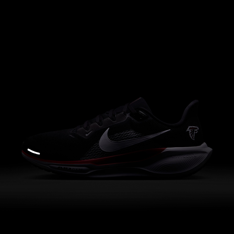 Nike Atlanta Falcons Pegasus 41 running shoes in black with mesh upper, silver swoosh, team logo, and red accents, side view.