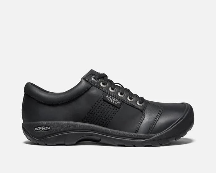 Keen Austin casual shoes in black leather with padded collar and durable rubber outsole, side view.