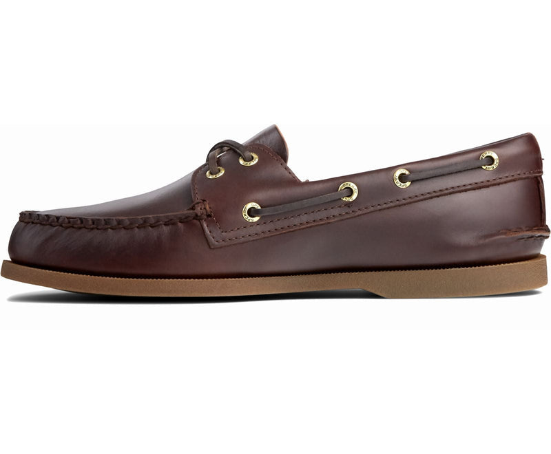 Sperry Authentic Original™ Boat Shoe in dark brown leather with moccasin stitching and gold eyelets, side view.