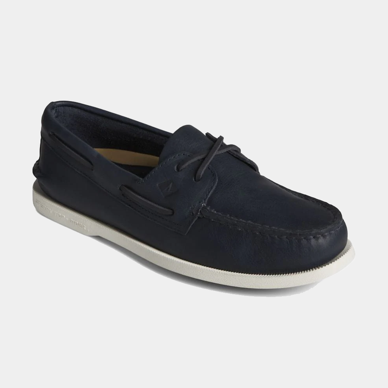 Sperry Authentic Original™ Cross Lace boat shoe in navy leather with moccasin stitching and white rubber outsole, side view.