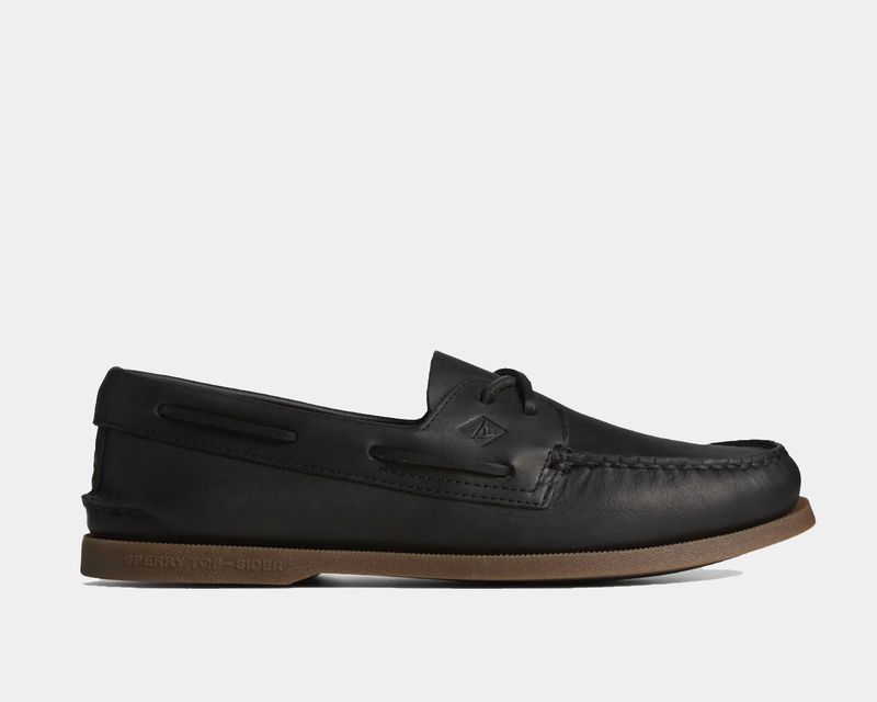 Sperry Authentic Original™ Cross Lace boat shoes in black leather with moc-toe stitching, side view.