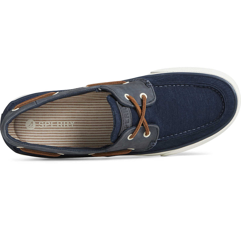 Sperry Bahama II Linen Sneaker in navy blue with linen upper, brown leather laces, and striped insole, top view.