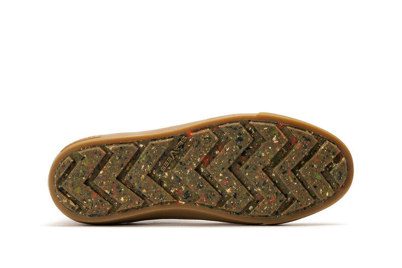 SeaVees Ballard Boot sole with recycled rubber outsole featuring multi-colored speckles and herringbone tread pattern, bottom view.