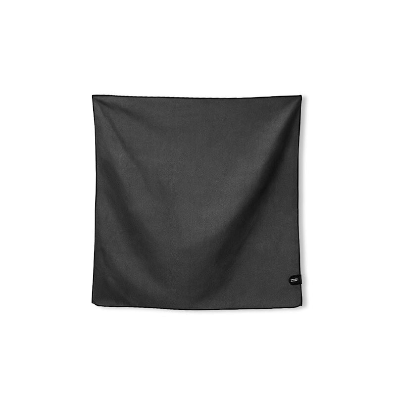 Nomadix Bandana Towel in solid charcoal gray, lightweight and made from quick-drying, durable material, front view.