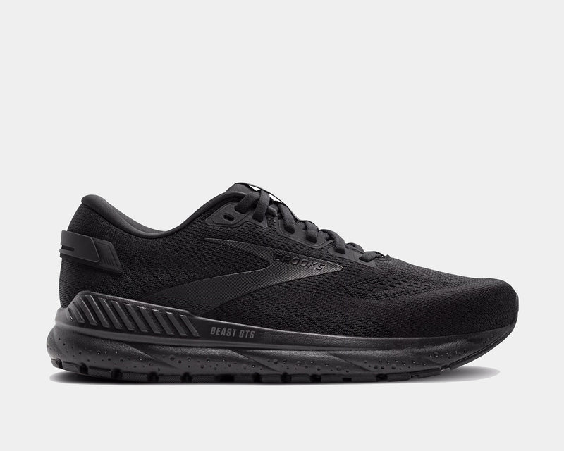 A pair of Brooks Beast GTS 24 running shoes with all black color way, featuring the Brooks logo on the side.
