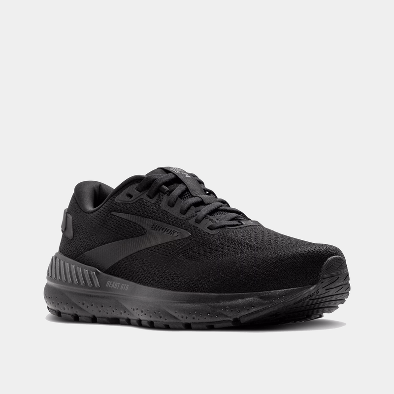 A pair of Brooks Beast GTS 24 running shoes with all black color way, featuring the Brooks logo on the side.