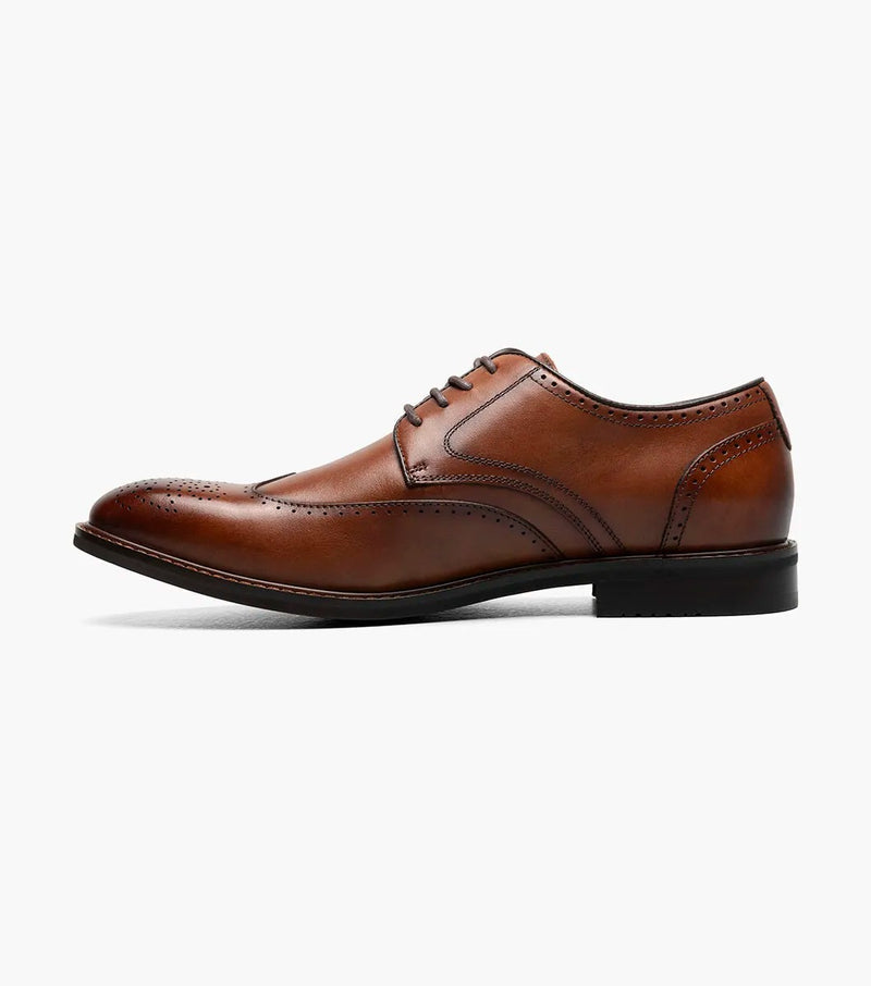 Stacy Adams Bennett Wingtip Oxford shoes in brown leather with perforated detailing and lace-up closure, side view.