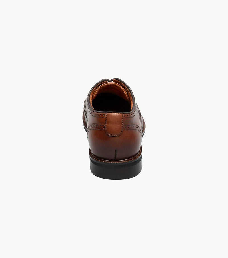 Stacy Adams Bennett Wingtip Oxford in brown leather with brogue detailing and black sole, back view showing heel counter.