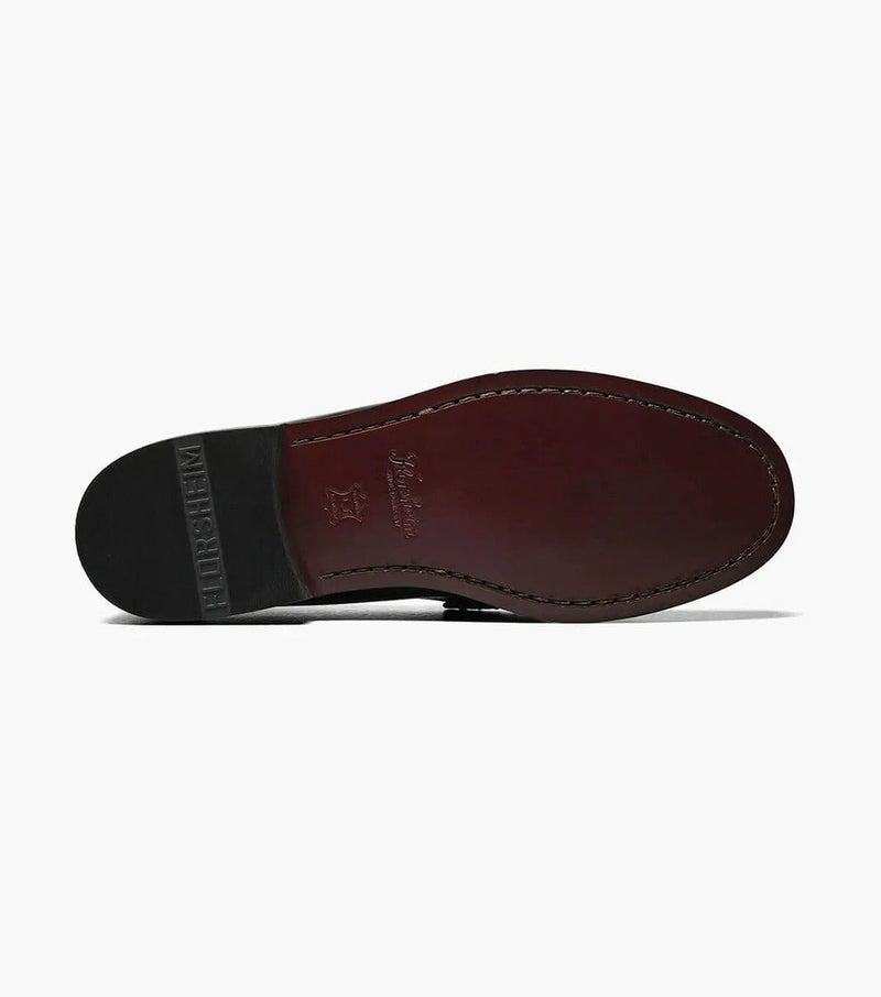 Florsheim Berkley Penny Loafer outsole in dark brown leather with stitched detailing and embossed branding.
