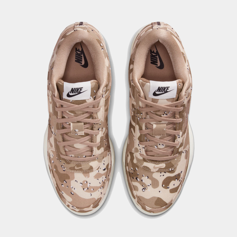 Nike Book 1 SE sneakers in beige camouflage pattern with lace-up closure and white Nike-branded tongue patch, top view.