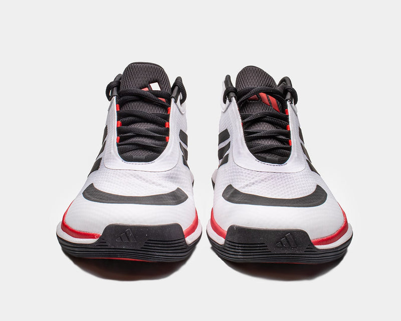 Adidas Bounce Legends athletic shoes in white with black and red accents, mesh upper and front view showing lace-up design.