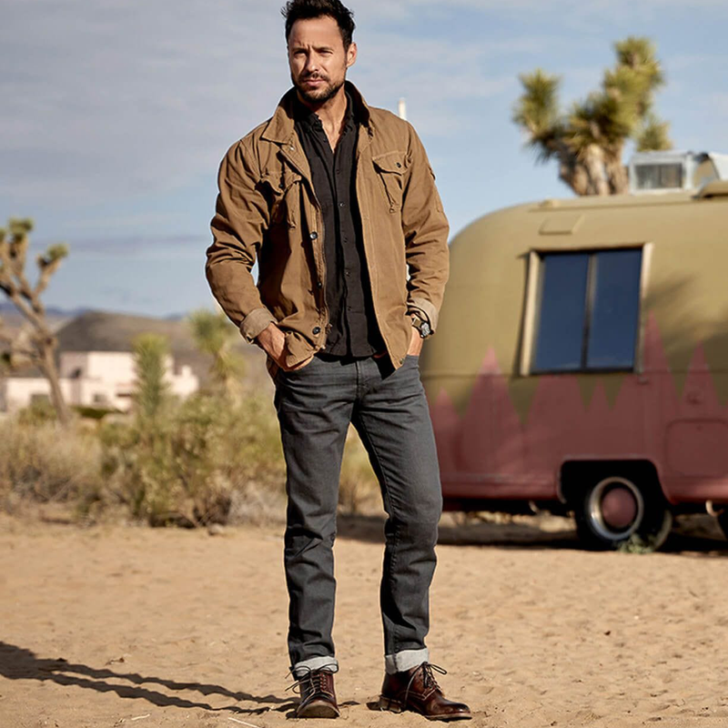"Bed Stu Bradley boots in brown leather with a distressed finish, worn outdoors with rolled-up jeans."