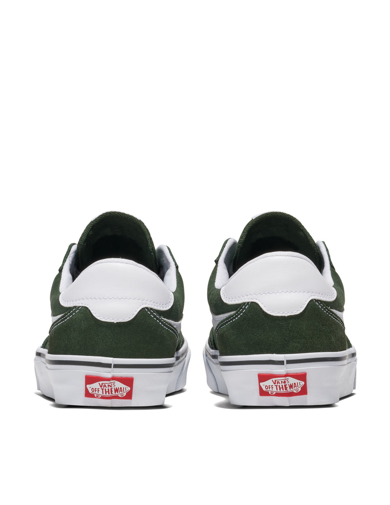 Vans Brooklyn sneakers back view showcasing green suede upper, white heel panel, and signature red Vans logo on white sole.