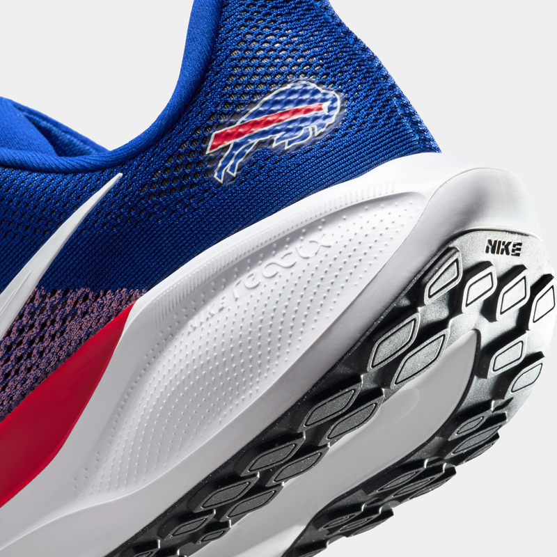 Nike Buffalo Bills Pegasus 41 running shoes with a blue mesh upper, Buffalo Bills logo, React foam midsole, and black rubber outsole, close-up side view.