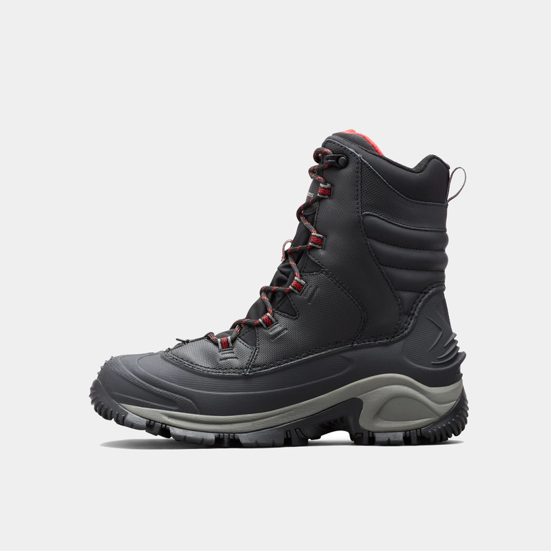 Columbia Bugaboot III winter boots in black with red accents, waterproof construction, and rugged sole, side view.